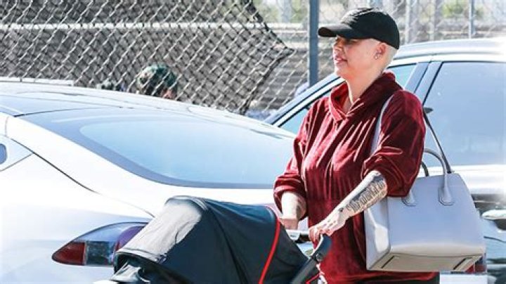 Amber Rose Kisses Baby Slash, 5 Mos, In Precious Insta Video With New Forehead Tattoo On Full Display