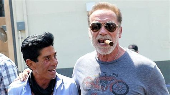 Arnold Schwarzenegger, 74, Looks Buff As He Steps Out With A Cigar At Beverly Hills Hair Salon