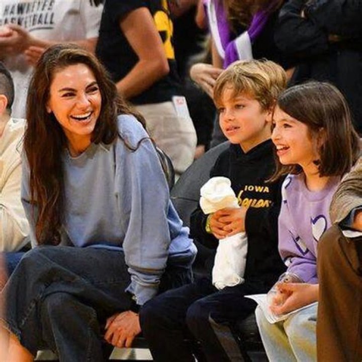Ashton Kutcher & Mila Kunis Cuddle Up For Family Outing At Universal Studios: Photo