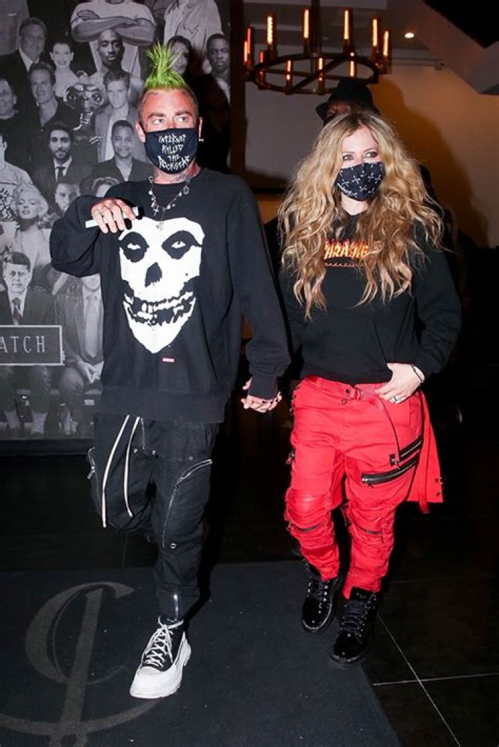 Avril Lavigne & New BF Mod Sun Share PDA During Dinner Date After He Gets A Tattoo Of Her Name