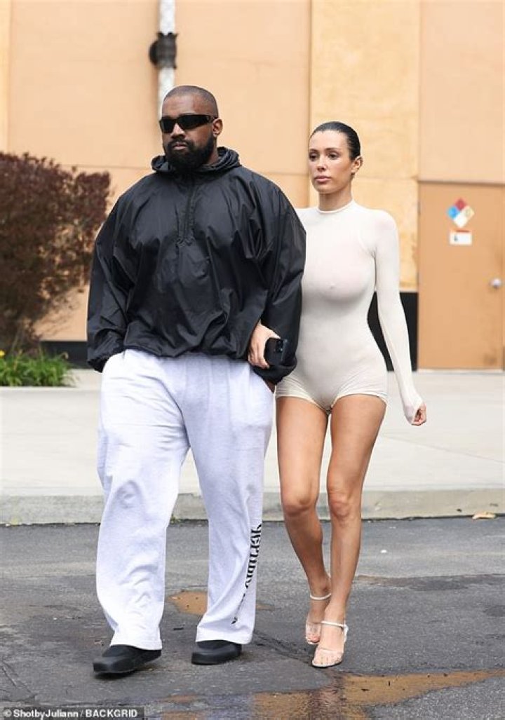 Bianca Censori Wears Cheeky White Bodysuit on Shopping Trip With Husband Kanye West in Japan