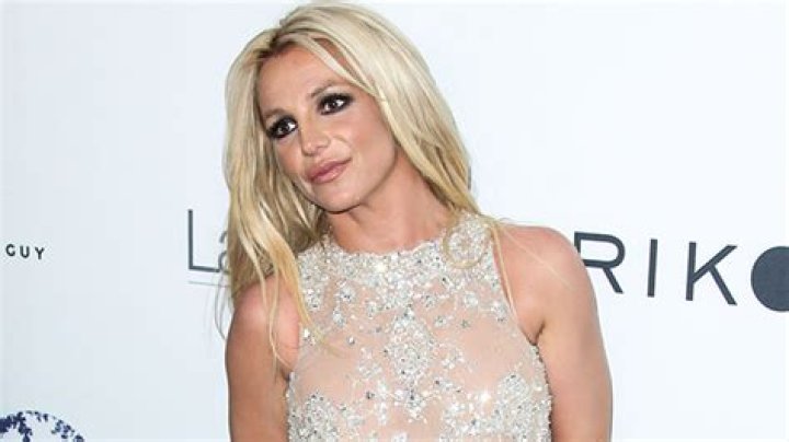 Britney Spears White Lingerie & Plunging Red Bodysuit In Dance Video – Hollywood Life