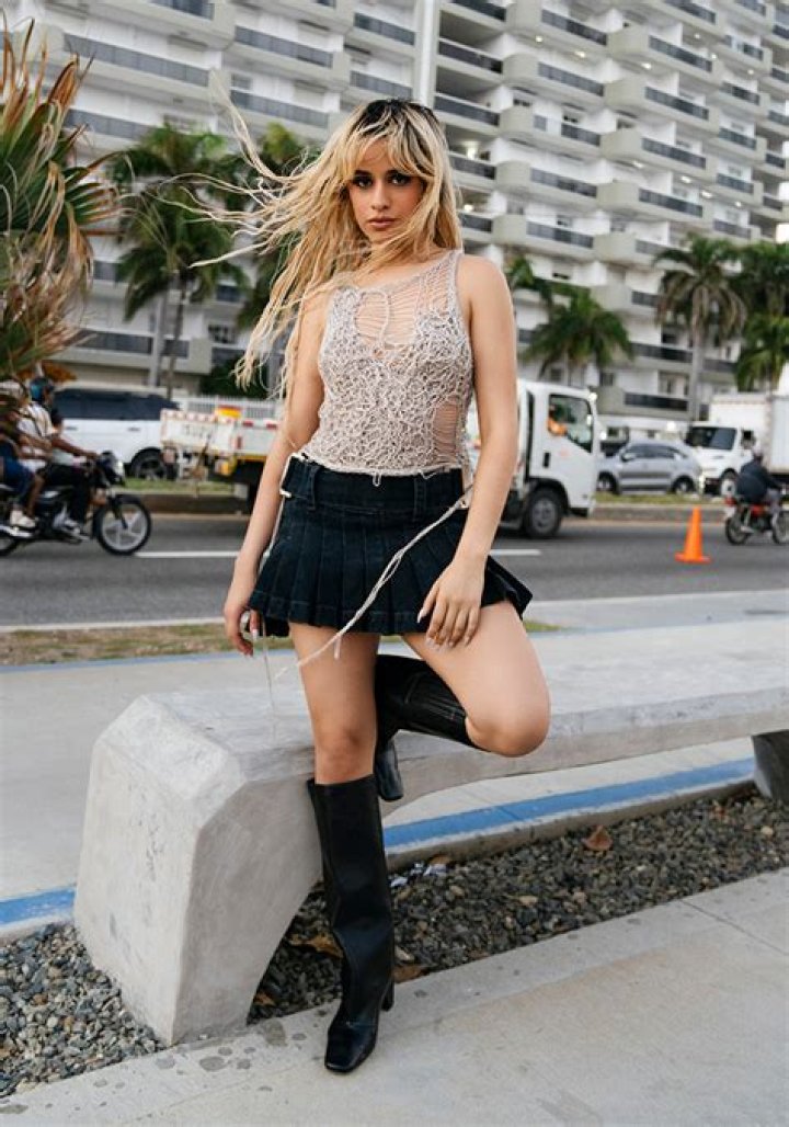 Camila Cabello Slays in Miniskirt & Knee-High Boots in Bacardi Campaign: Photos
