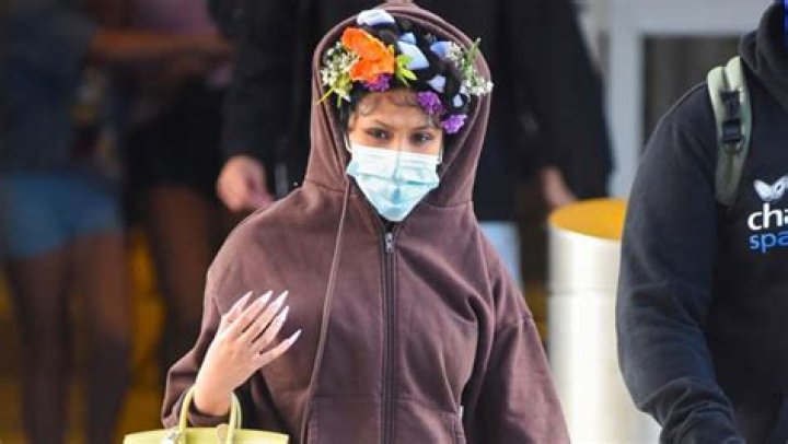 Cardi B Rocks A Flower Headpiece & Rainbow Birkin At NYC Airport – Hollywood Life