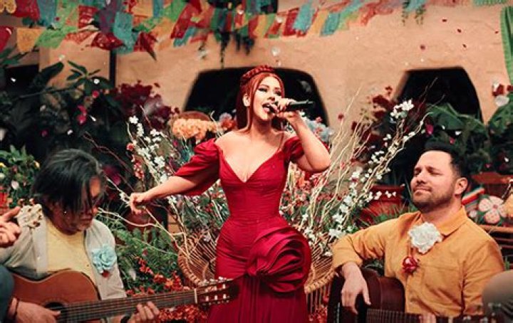 Christina Aguilera Wears Fiery Red Dress in “La Reina” Music Video – Hollywood Life