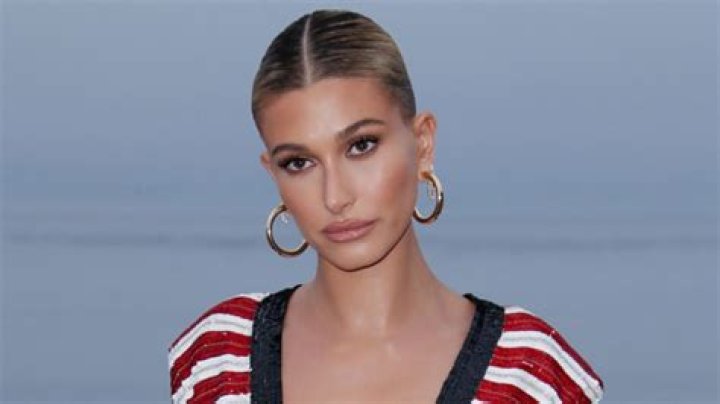 Hailey Baldwin Shows Off Her Stunning Figure In Tiny Snakeskin Bikini As She Plays With A Lemur