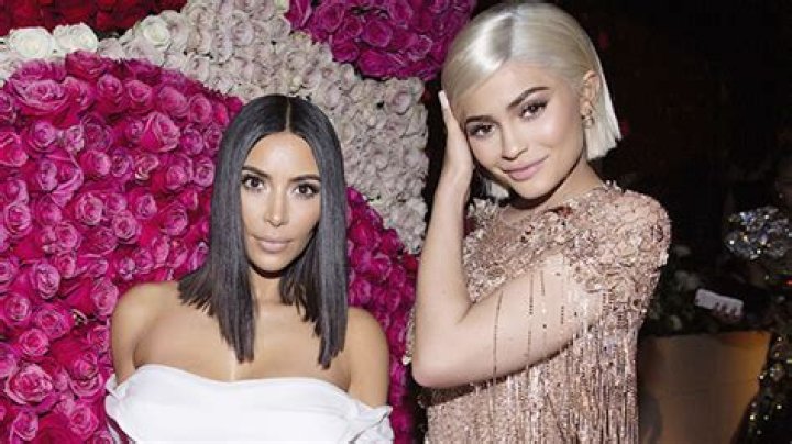 Kim Kardashian Appears To Have 6 Toes In Fragrance Promo Pic With Kylie Jenner & Fans Freak