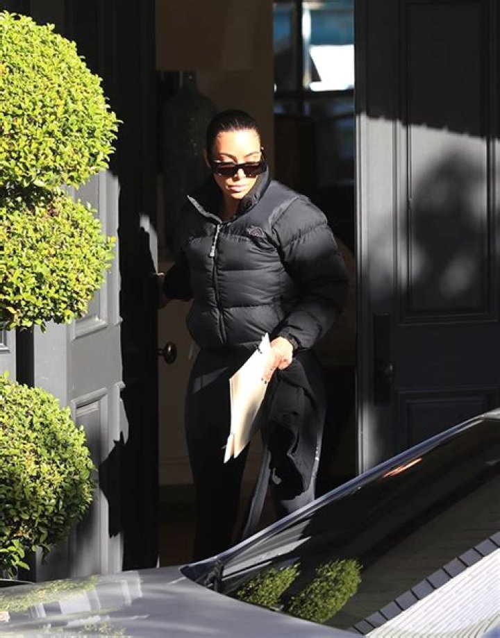 Kim Kardashian Holds A Folder Of Papers After Kanye West Clapback – Hollywood Life