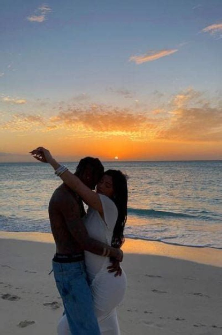 Kylie Jenner & Shirtless Travis Scott Share Romantic Sunset Embrace On The Beach: Photos