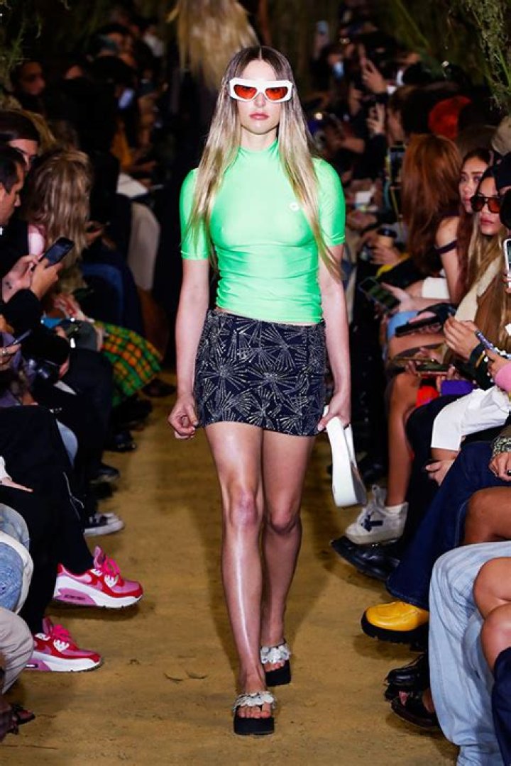 Steve Jobs’ Daughter Eve, 23, Hits The Runway In Neon Green For Paris Fashion Week