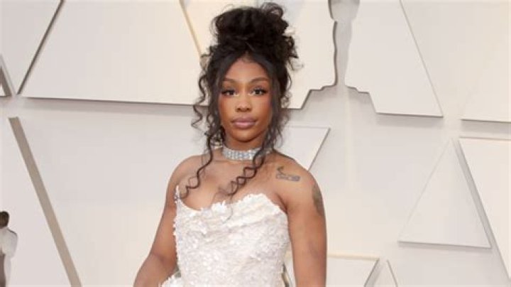SZA Stuns In A Strapless Dress With Sultry Thigh-High Slit At The Oscars